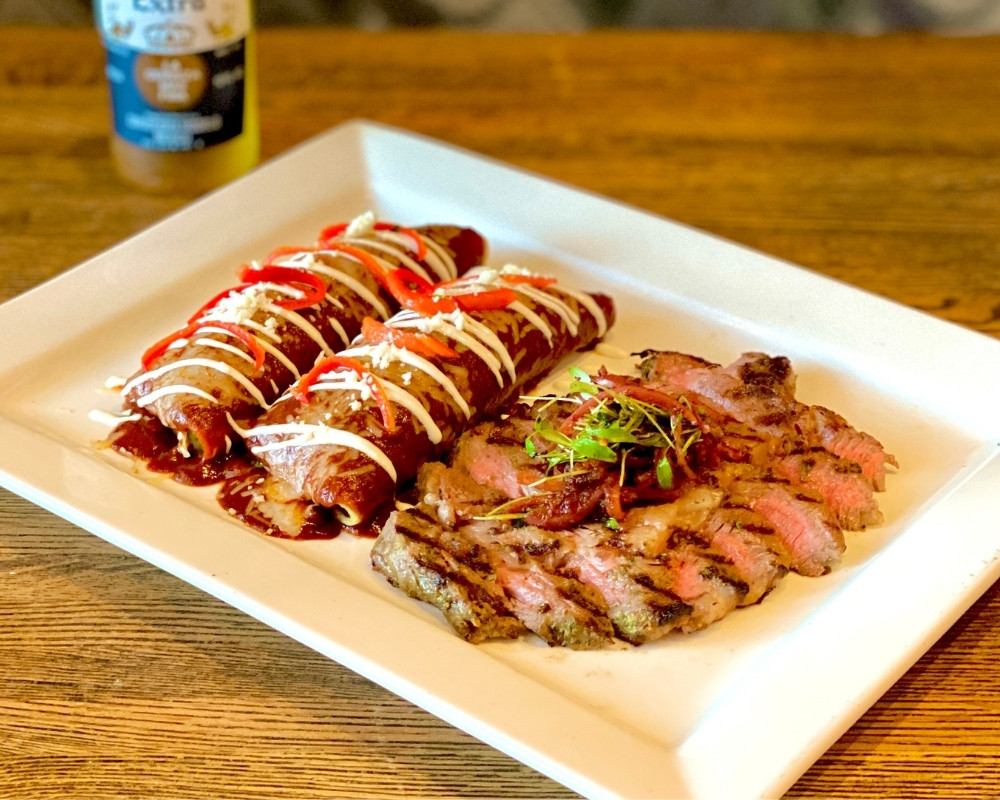 Plated Enchiladas and steak meal
